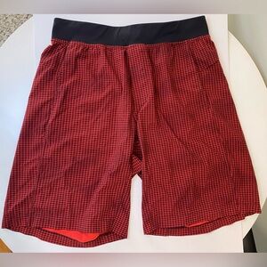 Men large Lululemon shorts red grid pattern